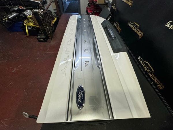 white OEM tailgate for a 2017–2022 Ford F-250 or F-350 Platinum truck - Image 4